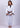 Women’s signature BJJ gi in white with 450 GSM jacket and 10 oz rip‑stop pants; premium embroidered design.