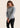 Women’s long‑sleeved technical BJJ rashguard in Silver, featuring four‑way stretch and mesh ventilation. Unique womens fit.