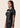 Women’s original BJJ rashguard in black, minimalistic design, 100% IBJJF legal.