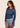 Women’s long‑sleeved technical BJJ rashguard in Blue, featuring four‑way stretch and mesh ventilation. Unique womens fit.