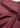 Close-up of maroon fabric with folds