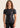 Women’s Prism BJJ rashguard in black Jacquard Lycra with geometric prism pattern, short sleeves, compression fit.