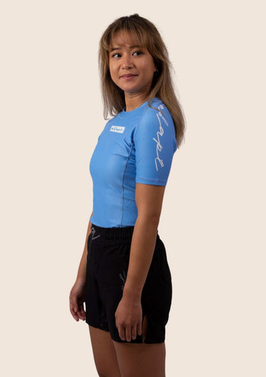 Women’s original BJJ rashguard in Sky Blue, minimalistic design, 100% IBJJF legal.
