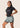 Unisex dual‑layer combination shorts with sage green paisley pattern; built‑in Lycra liner; secure fit.