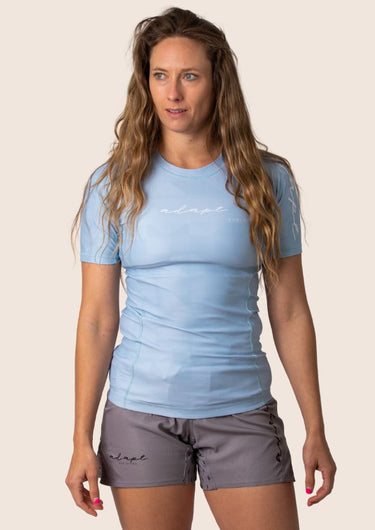Women’s Prism BJJ rashguard in blue ice Jacquard Lycra with geometric prism pattern, short sleeves, compression fit.
