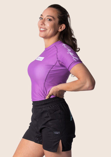 Women’s original BJJ rashguard in orchid purple, minimalistic design, 100% IBJJF legal.
