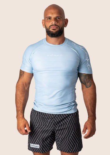 Men’s Prism BJJ rashguard in blue ice Jacquard Lycra with geometric prism pattern, short sleeves, compression fit.