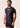 Men’s original BJJ rashguard with pink geometric design on black background.