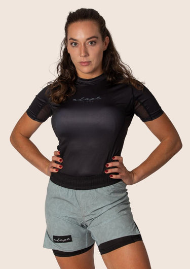 Women’s classic BJJ rashguard in Black; feminine cut; simple classic design.