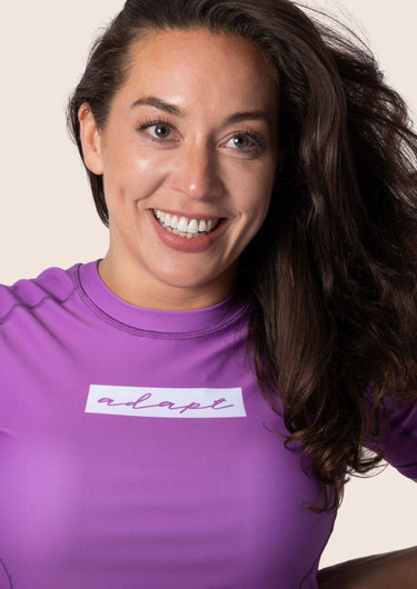 Women’s original BJJ rashguard in orchid purple, minimalistic design, 100% IBJJF legal.