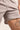 Unisex Jiu‑Jitsu training shorts in mid‑grey; lightweight construction with drawstring waistband.