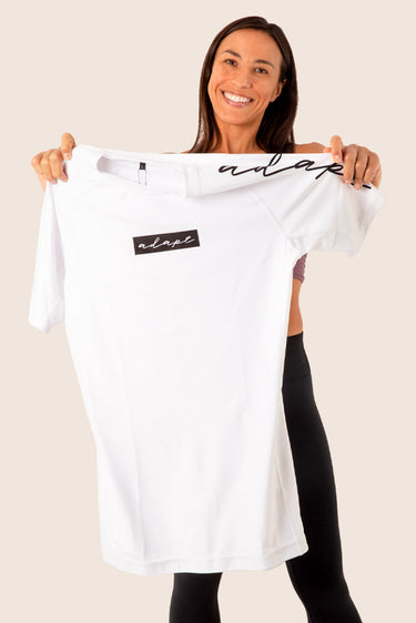 Women’s original BJJ rashguard in white, minimalistic design, 100% IBJJF legal.