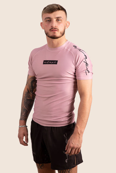 Men’s original BJJ rashguard in pink, minimalistic design.