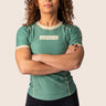 Women’s technical BJJ rashguard in matcha green, featuring four‑way stretch and mesh ventilation.