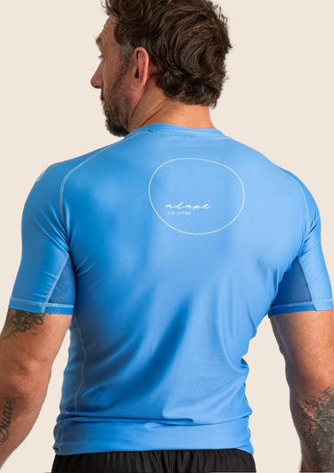 Men’s original BJJ rashguard in Sky Blue, minimalistic design, 100% IBJJF legal.