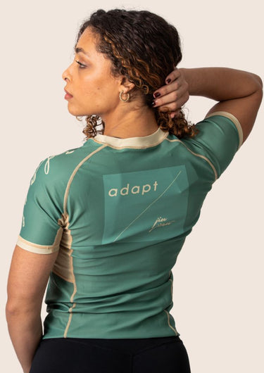 Women’s technical BJJ rashguard in matcha green, featuring four‑way stretch and mesh ventilation.