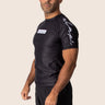 Men’s original BJJ rashguard in black, minimalistic design, 100% IBJJF legal. 