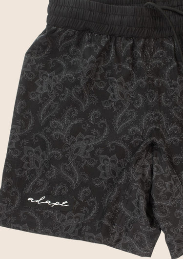 Unisex Jiu-Jitsu dual‑layer combination shorts with black paisley pattern; built‑in compression liner; adjustable fit.