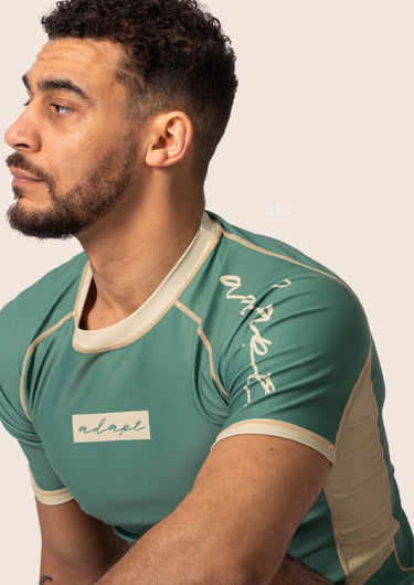 Men’s technical BJJ rashguard in matcha green, featuring four‑way stretch and mesh ventilation.