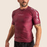 Men’s Prism BJJ rashguard in deep maroon Jacquard Lycra with geometric prism pattern, short sleeves, compression fit. 