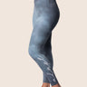 Women’s high‑waisted training leggings in onyx grey; matte finish; supportive compression.