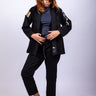 Women’s signature BJJ gi in black with 450 GSM jacket and 10 oz rip‑stop pants; premium embroidered design.