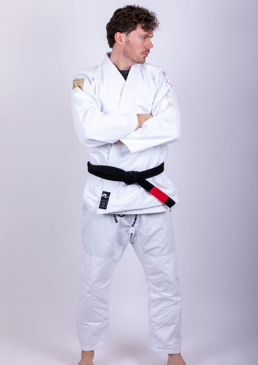Men’s signature BJJ gi in white with 450 GSM jacket and 10 oz rip‑stop pants; premium embroidered design.
