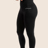 Women’s high‑waisted BJJ training leggings in black with minimalist design; squat‑proof four‑way stretch.