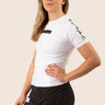 Women’s original BJJ rashguard in white, minimalistic design, 100% IBJJF legal.