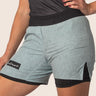 Unisex dual‑layer combination shorts with sage green paisley pattern; built‑in Lycra liner; secure fit.