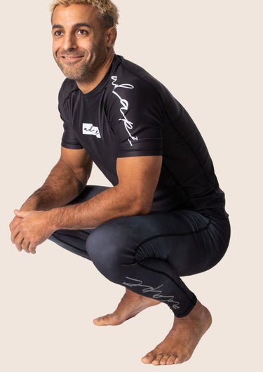 Men’s compression training spats with black smoke print; full‑length; four‑way stretch material.