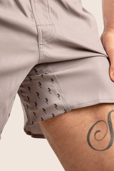 Unisex Jiu‑Jitsu training shorts in mid‑grey; lightweight construction with drawstring waistband.